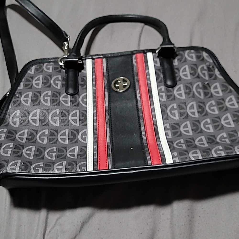 Giani bernini crossbody bag. Slightly used. Cleared inside and out.